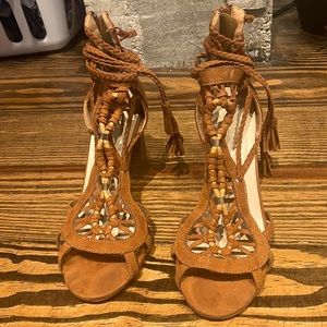 Laced up brown heels